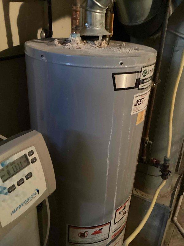 Performed comprehensive plumbing inspection and found significant calcification on water heater, particularly around the hot outlet side. Water testing revealed 3 ppm hardness levels, confirming water softener is functioning properly. No additional plumbing issues were identified throughout the property.