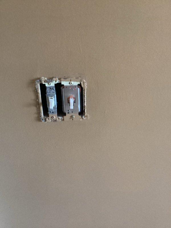 Performed electrical inspection and diagnosed multiple issues including a malfunctioning dimmer switch in master bedroom causing reduced light output, and intermittent operation of kitchen appliances. Determined disposal switch needed replacement while confirming dishwasher switch on countertop was functioning properly. Provided estimate for replacement dimmer switch installation.