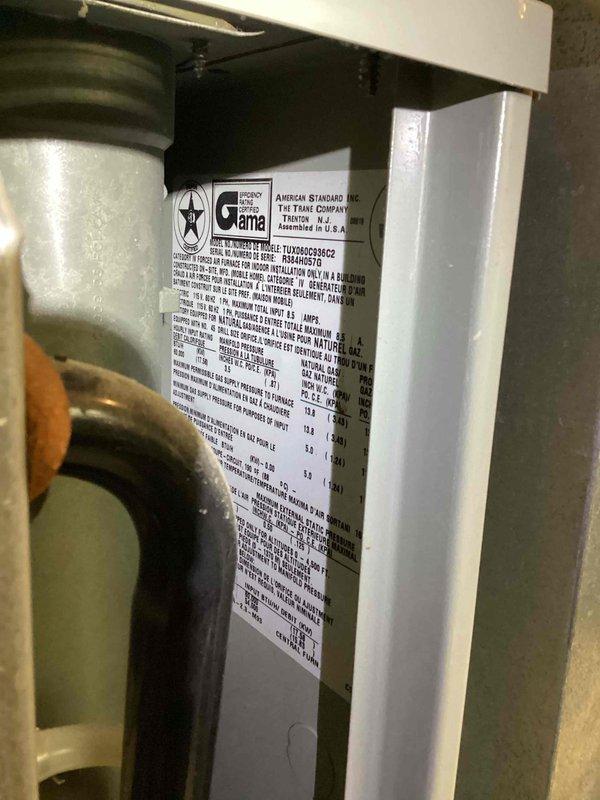 Performed comprehensive furnace tune-up on Goodman system located in basement mechanical room. Inspected all components including gas connections, PVC venting, and control board for proper operation. System is functioning within manufacturer specifications with no immediate concerns noted.