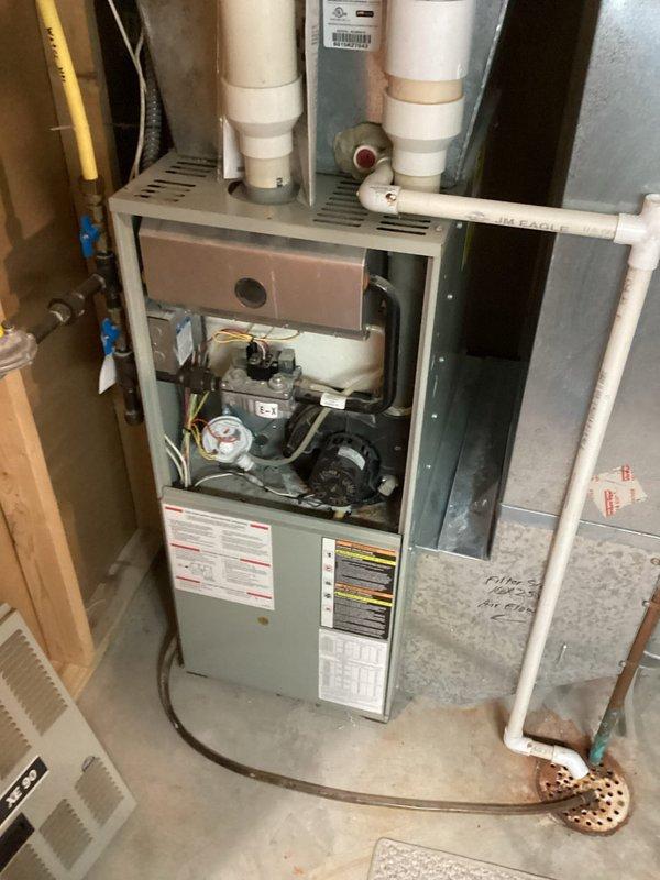 Responded to no heat complaint following previous service call. Diagnosed pressure switch wired incorrectly with reversed connections. Corrected wiring configuration and properly repositioned pressure switch hoses, restoring normal furnace operation.