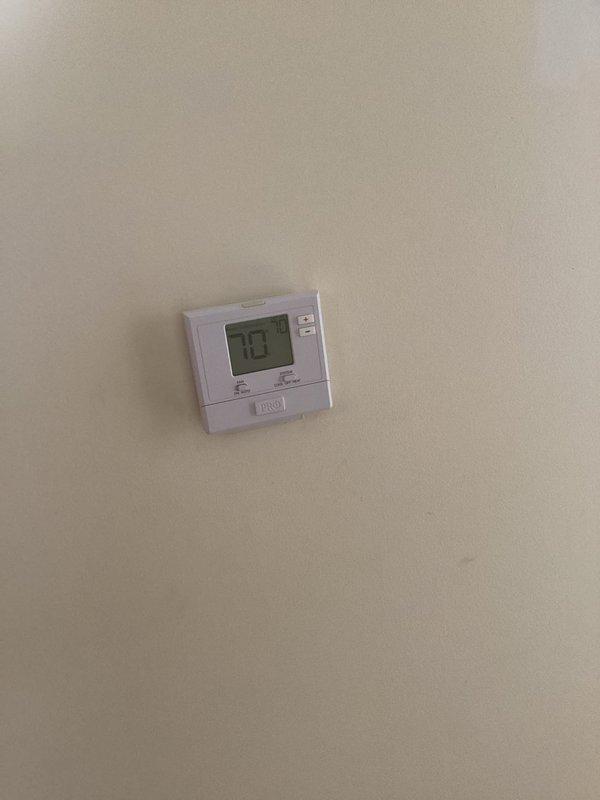 Conducted electrical inspection of residential property. Verified functionality of GFCI outlets and examined digital thermostat system set at 78 degrees. All inspected components appear properly installed and in normal working condition.