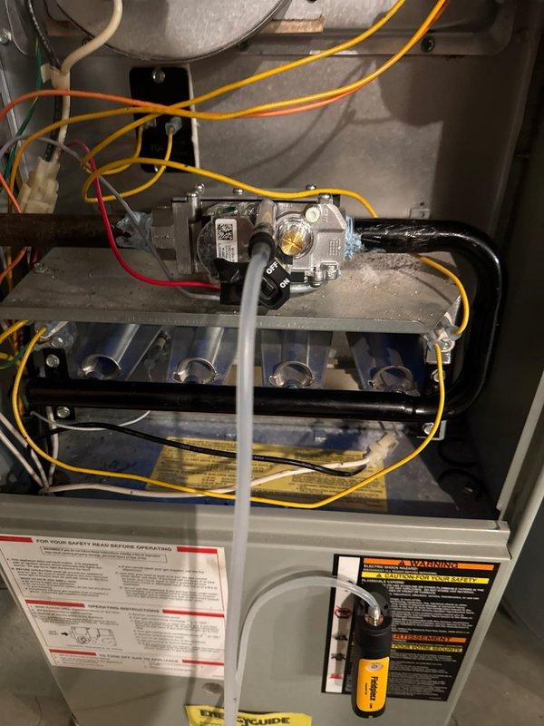 Responded to a callback for a furnace not producing heat. Diagnosed intermittent operation caused by a sticking gas valve. Previous repair was unsuccessful. Replaced gas valve, restoring proper system operation and heat production.