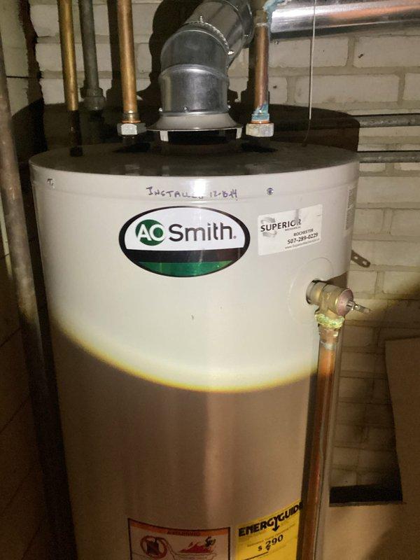 Conducted comprehensive plumbing inspection of residence, finding all systems in good working condition. Verified 40-gallon atmospheric vent water heater (A.O. Smith, installed 2014) operating properly, and confirmed Superior brand water softener functioning effectively with hardness testing at 2 ppm. No plumbing issues were identified throughout the property.