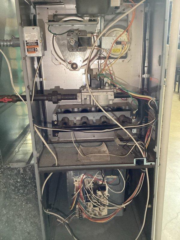 Responded to no-heat call where system was running fan but not producing heat due to pilot issues. Diagnosed high limit switch stuck in open position. Replaced faulty limit switch which restored proper heating function.