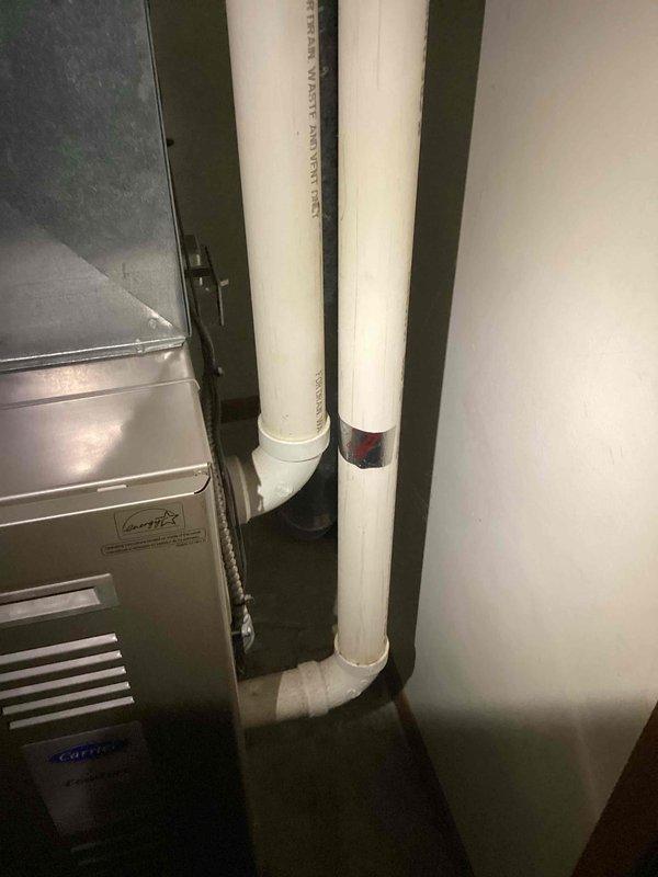 Completed prepaid maintenance service on residential furnace system. Inspected internal components including blower motor, fan blade, electrical wiring, and control boards. Examined ventilation system including connected PVC pipes, with particular attention to the pipe section with repair tape.