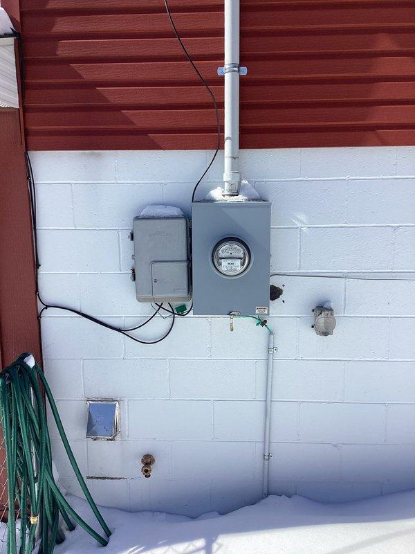 Performed scheduled electrical inspection service, arriving within the 8-12 timeframe. Inspected main electrical service panel, meter installation, and water shutoff system. Documentation completed and verification photos taken of properly installed electrical service components and labeled main water shutoff valve.