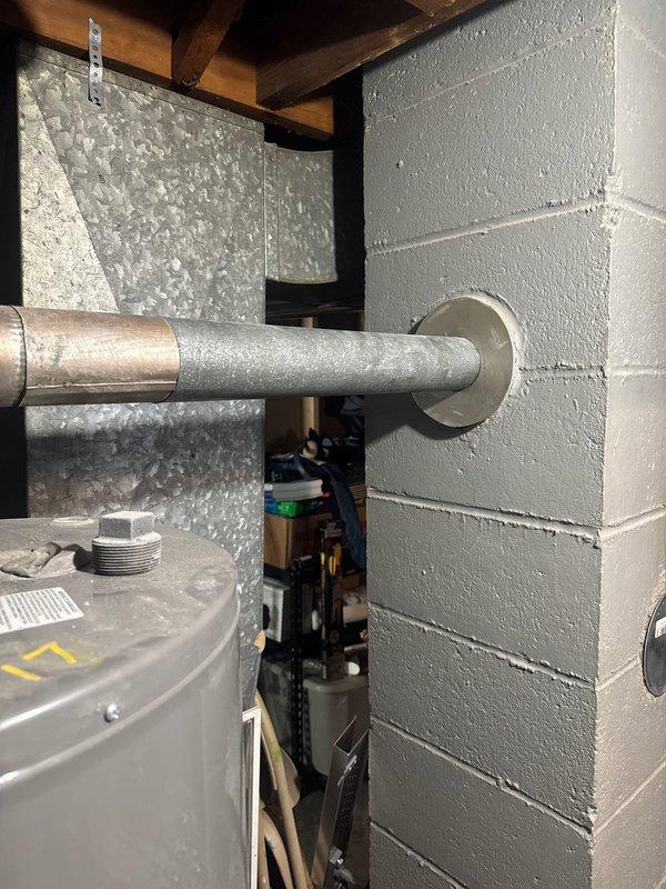 Responded to emergency call for basement flooding originating from a failed Richmond water heater. Upon inspection, identified active leak from the tank requiring immediate attention. Deployed sump pump to mitigate water damage, then provided customer with replacement water heater estimate after confirming unit (installed 1-2-17) was beyond repair.