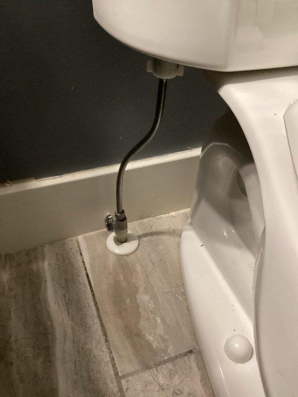 Diagnosed and repaired leaking toilet in upstairs hallway bathroom. Identified loose connections at both the fill valve and angle stop supply line. Tightened all connections and performed multiple flush tests to confirm successful resolution with no further leakage observed.