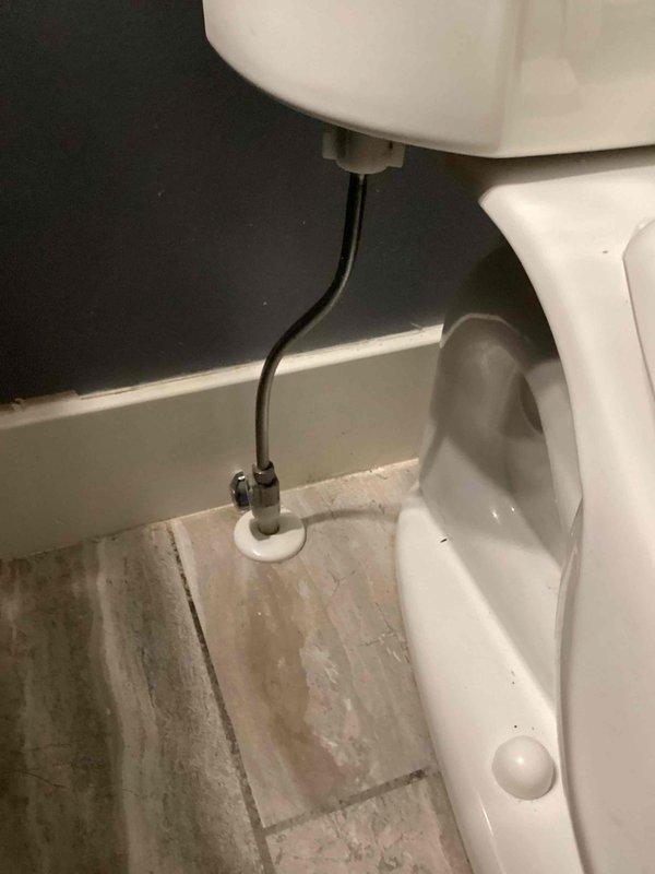 Diagnosed and repaired leaking toilet in upstairs hallway bathroom. Identified loose connections at both the fill valve and angle stop supply line. Tightened all connections and performed multiple flush tests to confirm successful resolution with no further leakage observed.