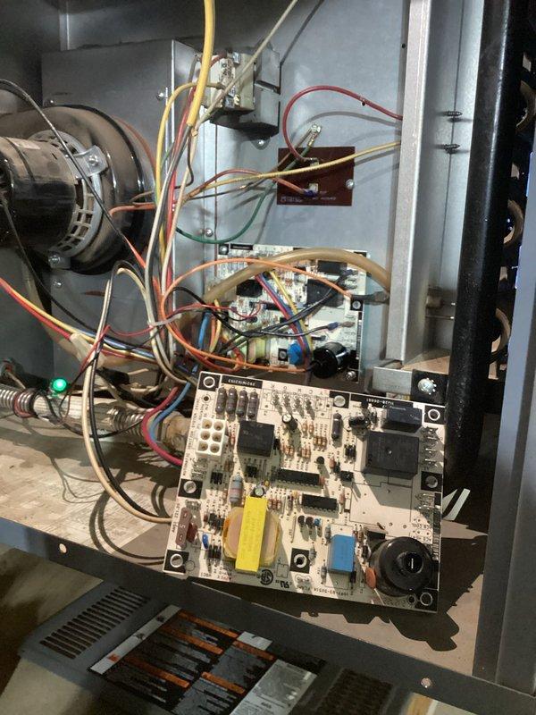 Arrived on site to install control board for garage heater as scheduled. Accessed the furnace, removed the existing circuit board, and successfully installed the replacement control board with proper wire connections. Verified system operation with green indicator light confirming proper functionality.