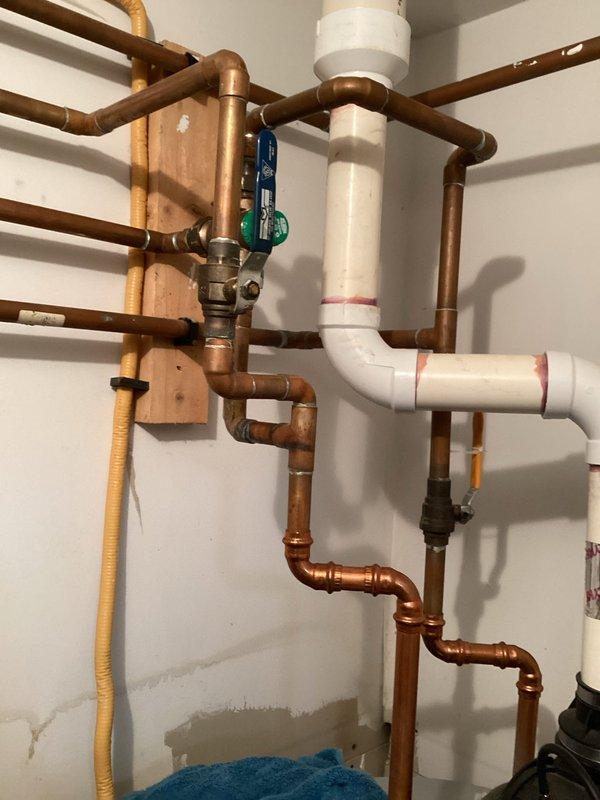 Responded to service call for water heater leakage. Upon inspection, identified two loose unions at the backflow preventer with failing gaskets. Removed old gaskets, installed new ones, and restored water service to the home with successful resolution of the leak.