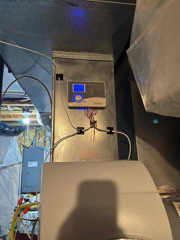 Responded to callback for whole home humidifier not functioning after previous furnace service. Diagnostic inspection revealed disconnected C-wire at the furnace. Restored proper operation by connecting the C-wire to complete the control circuit for the Aprilaire humidifier.