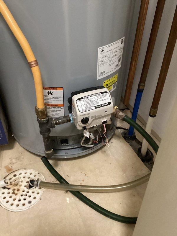Responded to warranty service call for 2-year-old AO Smith water heater. Installed customer-supplied warranty parts including gas control valve, wiring, and burner assembly. After installation, unit would light pilot but flame would extinguish when igniter was released. Contacted supervisor regarding further warranty options for the unit.