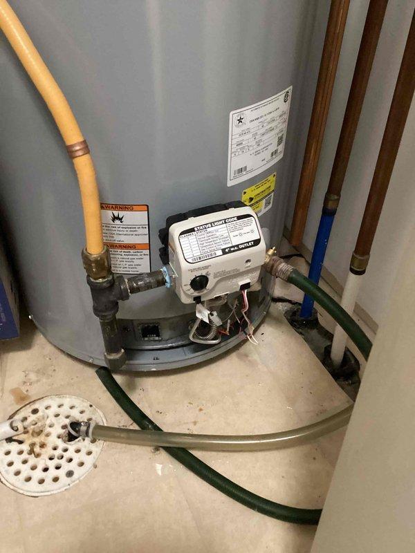 Responded to warranty service call for 2-year-old AO Smith water heater. Installed customer-supplied warranty parts including gas control valve, wiring, and burner assembly. After installation, unit would light pilot but flame would extinguish when igniter was released. Contacted supervisor regarding further warranty options for the unit.