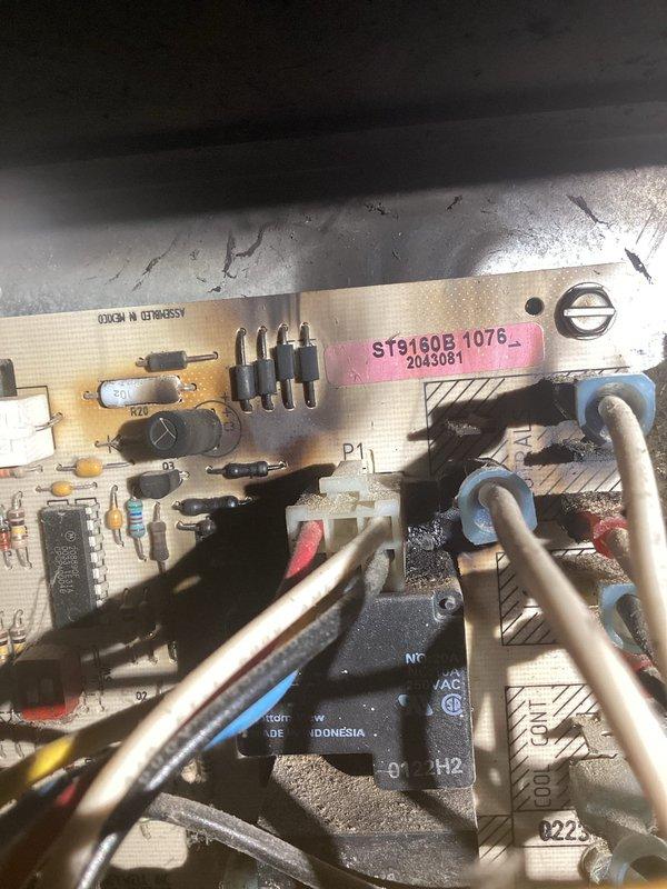 Responded to no-heat service call for aging furnace. Diagnosed failed control board (ST9130B 1076) with smoking transformer and deteriorated wire harness. Provided quote for necessary repairs and scheduled project manager to discuss replacement options due to unit's age and multiple component failures.