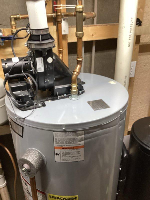 Successfully replaced the temperature and pressure relief valve and anode rod on the water heater per the sold bid. Verified proper operation after installation by restoring water supply to the unit and confirming all components were functioning correctly with no leaks.