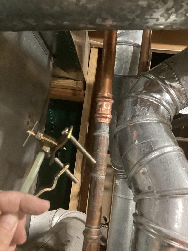 Diagnosed and repaired water leak originating from faulty humidifier valve at furnace. Completed necessary repair to stop active leak while furnace remains operational. Provided documentation for replacement valve option.