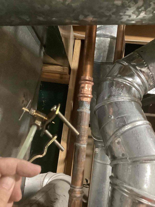 Diagnosed and repaired water leak originating from faulty humidifier valve at furnace. Completed necessary repair to stop active leak while furnace remains operational. Provided documentation for replacement valve option.