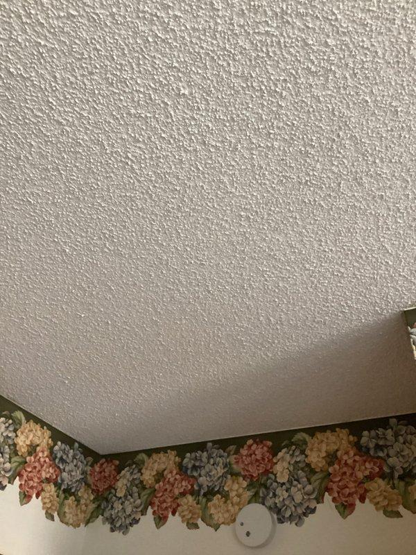 # Electrical Service - Inspection Summary

Completed FRM (Final Residential Mechanical) electrical inspection at residential property. Identified three code compliance deficiencies requiring correction: absence of hardwired interconnected smoke alarm system per current electrical code requirements, washing machine receptacle outlet lacking required GFCI protection, and water supply system not properly bonded to electrical grounding system. Documented all deficiencies with photographic evidence showing existing battery-operated smoke detectors and overall electrical infrastructure. Provided detailed estimates for remediation work to bring property into full code compliance and completed inspection report for permitting authority.