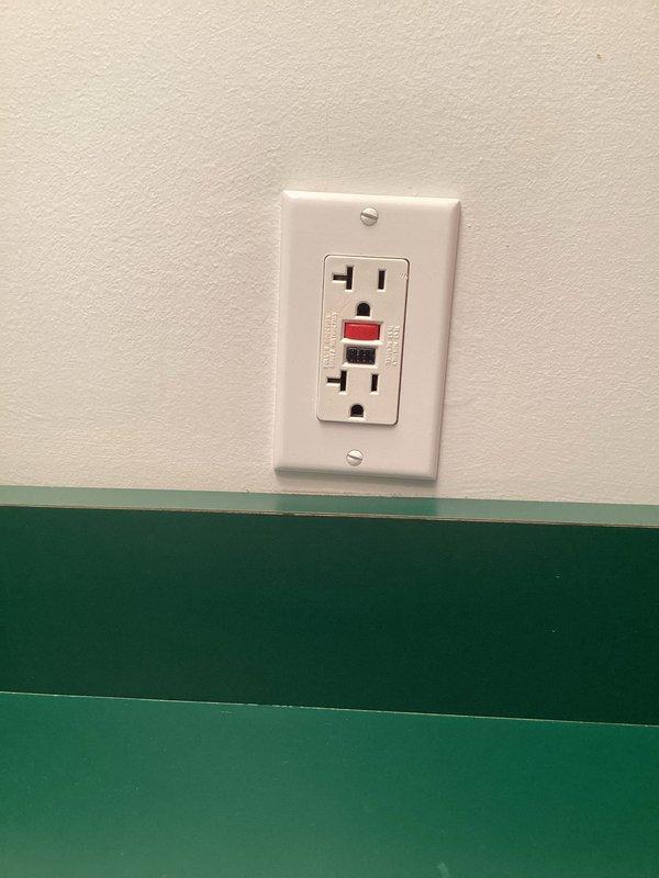 Completed scheduled electrical inspection of residential property. Inspected and documented GFCI outlet installation on interior wall and ceiling-mounted fan with integrated lighting fixture, verifying proper operation and safety compliance. All components found in satisfactory working condition with no deficiencies noted.