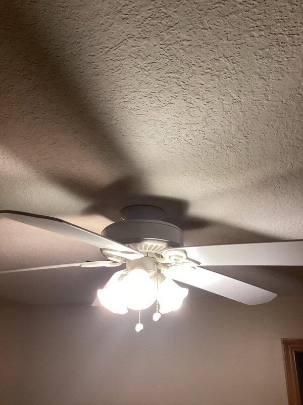 Completed scheduled electrical inspection of residential property. Inspected and documented GFCI outlet installation on interior wall and ceiling-mounted fan with integrated lighting fixture, verifying proper operation and safety compliance. All components found in satisfactory working condition with no deficiencies noted.