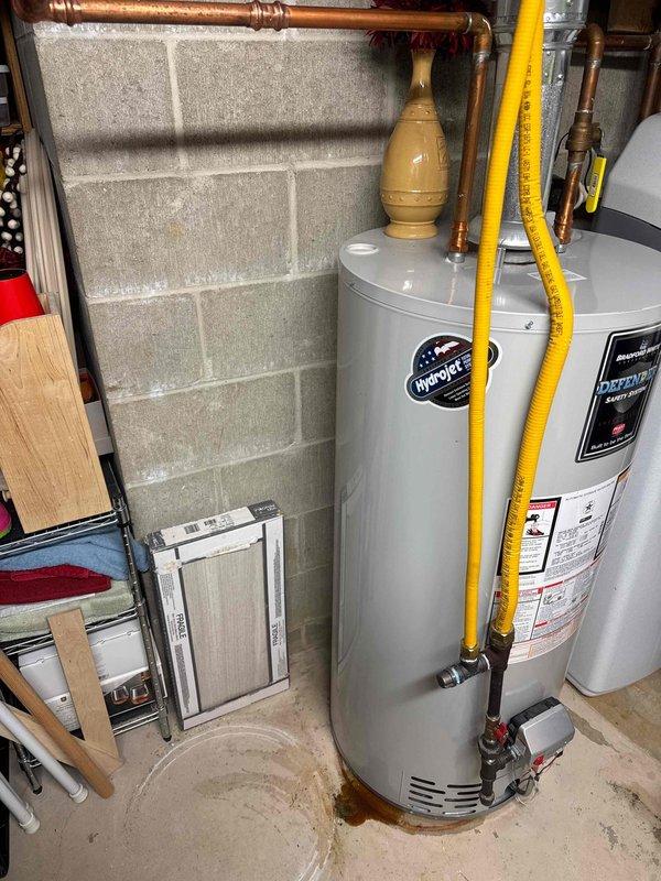Removed one 40-gallon water heater from a dual water heater installation per sold bid specifications. Completed re-piping work, disconnected all water and gas connections, safely extracted the unit, and performed gas leak inspection on remaining system to ensure proper operation.