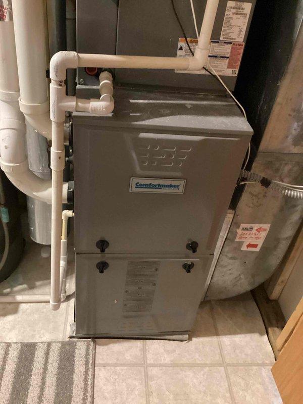 Completed electrical inspection of residential property with focus on safety compliance. Identified washer outlet lacking required GFCI protection per current electrical code requirements. Documented existing electrical conditions including standard duplex receptacle and furnace installation. Provided estimate for GFCI upgrade to bring laundry area into compliance with safety standards.