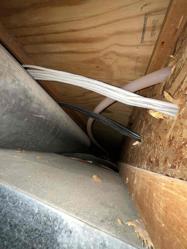 Conducted on-site assessment for Heat Recovery Ventilator (HRV) installation in attic space. Evaluated existing ductwork infrastructure, identified four dial-type controllers requiring integration, and determined requirement for 6-inch takeoff connection on return air system to facilitate proper fresh air distribution to building.