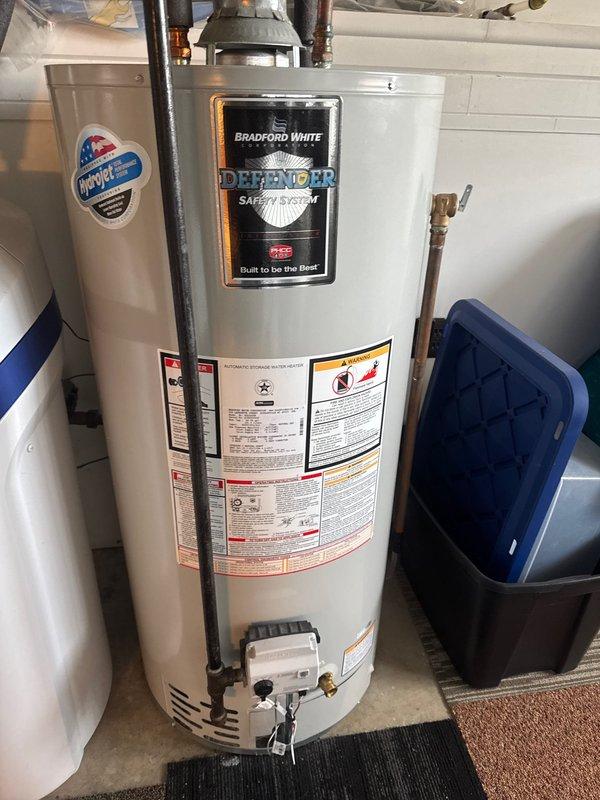 Responded to service call for damaged PVC piping in utility room affecting HVAC condensate drainage system. Upon arrival, identified cracked condensate drain line connected to air handler unit, with visible water damage and moisture staining on concrete floor surrounding equipment base. Repaired damaged condensate drain piping to restore proper drainage function and prevent further water accumulation in the mechanical space.