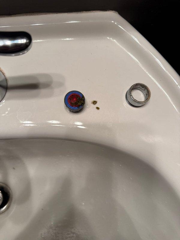 Responded to service call for lavatory faucet with no water flow. Upon inspection, identified clogged aerator as the source of the problem. Removed and replaced the defective aerator, restoring proper water flow and pressure to the fixture. Unit tested successfully upon completion.