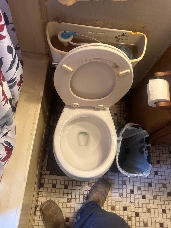 Responded to callback for reclogged toilet that was previously unclogged during initial service visit. Upon arrival, confirmed toilet was experiencing drainage issues again. Assessed fixture condition and determined repeated clogging indicated underlying problem beyond simple blockage. Removed and replaced toilet with new unit to resolve ongoing drainage concerns and ensure proper long-term function.