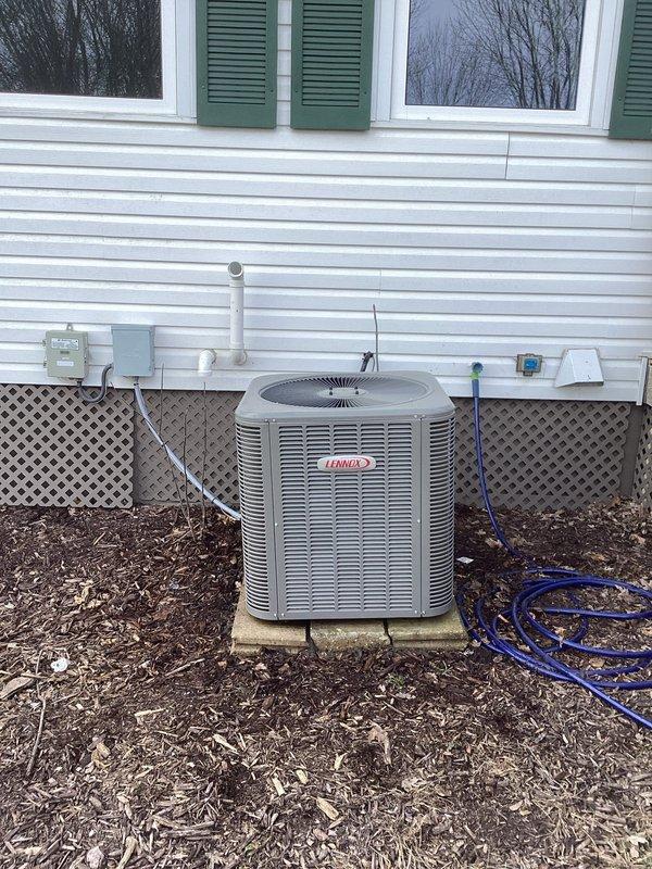 Responded to no cooling complaint on newer Lennox outdoor condensing unit. Upon arrival, performed system diagnostics and operational testing. System was found operating within normal parameters at time of service. Homeowner reported refrigerant had been previously added by another service provider and suspected ongoing leak. Visual inspection of unit and refrigerant lines revealed no obvious signs of active refrigerant loss or oil staining at common leak points. All electrical connections, contactors, and capacitor readings normal. Compressor and condenser fan motor operating properly with adequate airflow through coil. Advised homeowner to monitor system performance and contact for further diagnostics if cooling issues return.