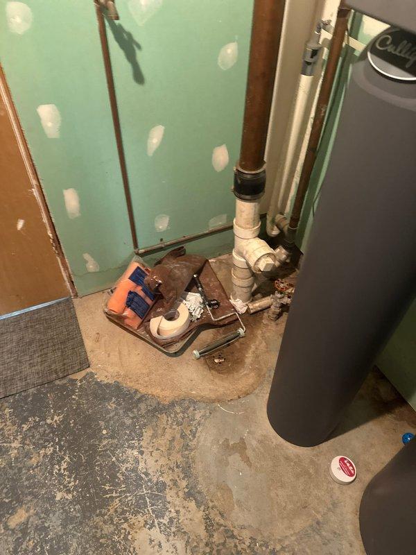 Responded to drainage backup affecting kitchen sink and washing machine caused by broken 2-inch cast iron drain line. Performed video camera inspection of the line to assess extent of damage and document deteriorated pipe condition. Photographed affected plumbing areas in basement showing compromised drainage system and documented findings for estimate preparation, as line requires replacement due to risk of further deterioration.