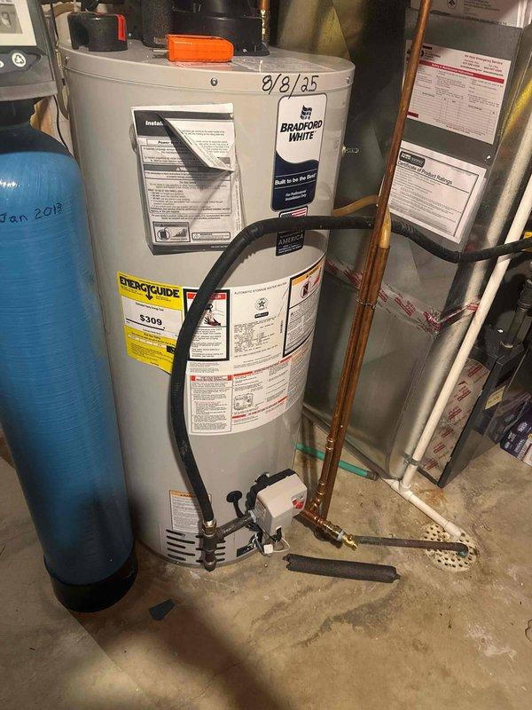 Responded to service call for malfunctioning hot water recirculating pump. Upon arrival, diagnosed that the recirculating pump had power but was not operating. Documented existing equipment configuration with photographs showing the pump installation, associated copper piping, electrical connections, and integration with the water heater system. Sent detailed images and pricing estimate for pump replacement to customer for approval of preferred unit model.