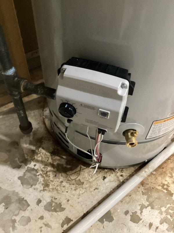 Responded to gas leak emergency at water heater installation. Upon arrival, identified leaking gas valve on newly installed unit and confirmed gas supply had been safely shut off. Removed defective gas valve assembly and installed replacement valve, restoring safe operation to the water heater system under warranty coverage.
