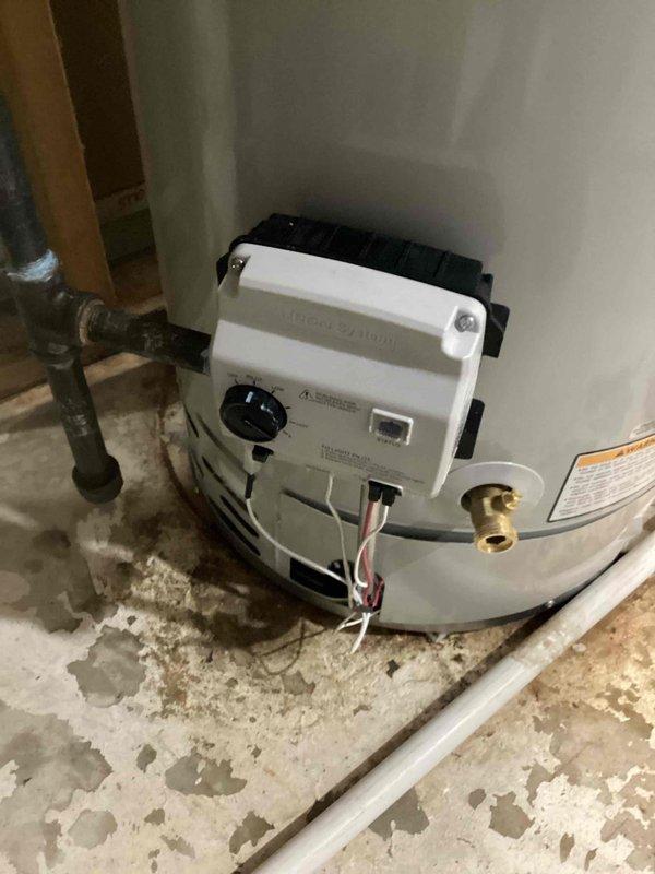 Responded to gas leak emergency at water heater installation. Upon arrival, identified leaking gas valve on newly installed unit and confirmed gas supply had been safely shut off. Removed defective gas valve assembly and installed replacement valve, restoring safe operation to the water heater system under warranty coverage.