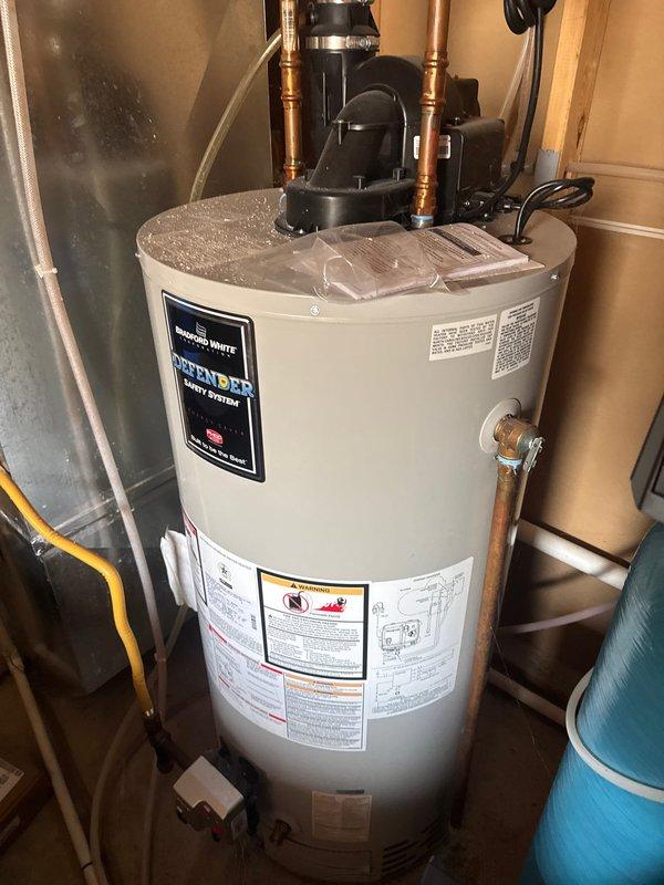 Responded to service call for refrigerator water line shut-off valve installation. Customer had new refrigerator delivered that required a dedicated shut-off valve within 3 feet of the appliance connection point. Successfully installed shut-off valve in basement utility area near water heater to meet manufacturer specifications and provide proper water supply control for the refrigerator ice maker and water dispenser.