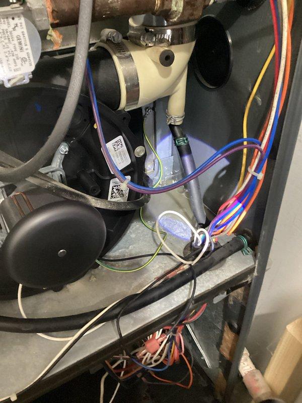 Responded to service call for non-operational furnace with reported water damage. Upon inspection, confirmed water intrusion had affected internal components including condensate drainage system and electrical connections. Documented extent of damage through photographic evidence showing compromised wiring, affected control modules, and water-damaged mechanical components. Provided estimate for necessary repairs to restore unit to proper working condition.