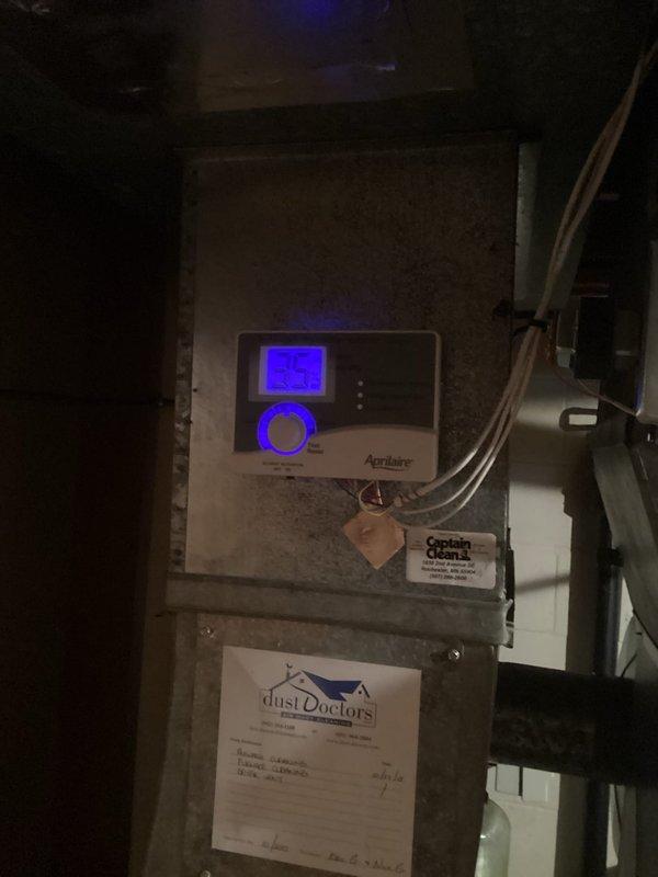 Responded to service call for blinking indicator lights on humidifier and furnace system. Successfully replaced furnace filter and reset humidifier control panel to clear maintenance alert. Inspected humidifier pad condition and verified proper operation of Aprilaire humidifier unit. All systems tested and confirmed functioning normally upon completion.