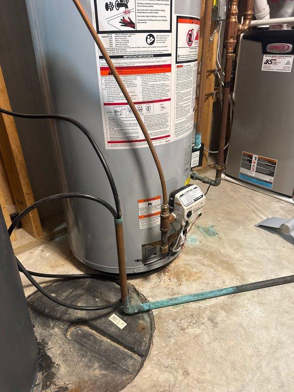 Responded to service call for water heater with pilot light failure. Upon arrival, found pilot light extinguished on A.O. Smith 50-gallon natural gas water heater (Model GCG 50 400). Successfully relit pilot light and verified proper ignition and operation without complications.