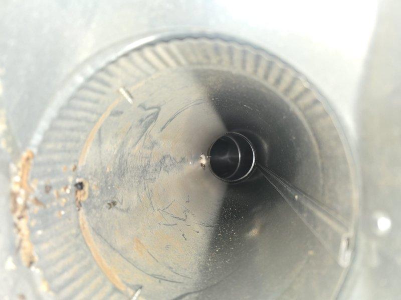 Completed comprehensive duct cleaning and dryer vent cleaning service to remove accumulated dust, debris, and lint buildup throughout the ventilation system. Thoroughly cleaned all accessible ductwork and vents, including blower assembly components where significant particulate matter and fibrous debris had collected on the squirrel cage blower wheel and housing interior, restoring proper airflow and system efficiency.