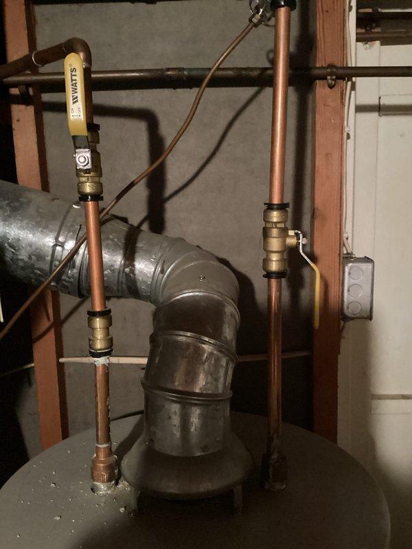 Responded to service call for leaking tanked water heater in basement utility room. Upon inspection, confirmed active leak originating from bottom of tank, indicating internal tank failure. Documented existing installation including copper supply lines, expansion tank, safety components, and proper venting configuration. Provided comprehensive estimate for complete water heater replacement with new unit, including removal and disposal of failed equipment, installation of new tanked water heater with code-compliant connections, and integration with existing plumbing infrastructure.