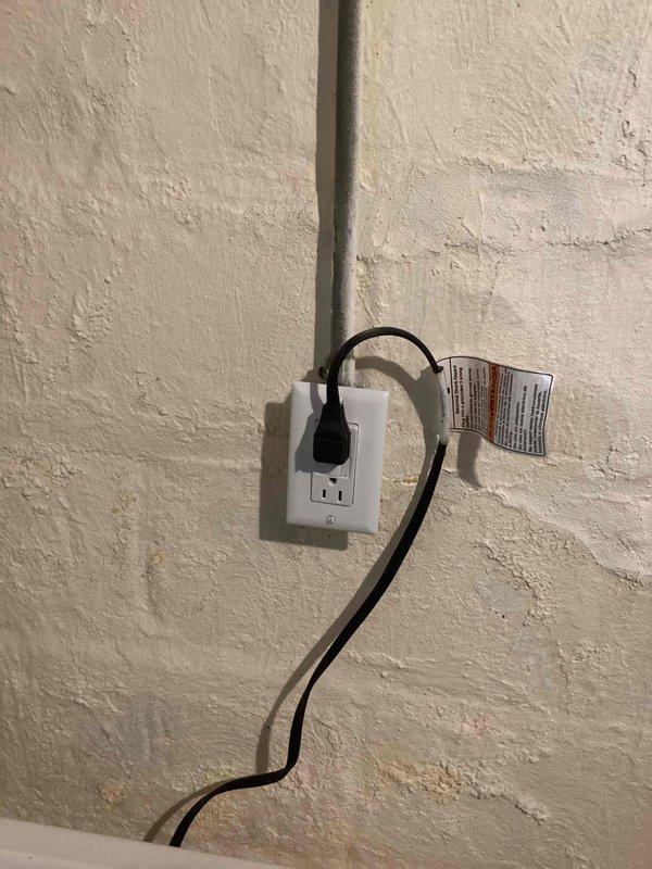 Installed GFCI outlet in laundry room to provide ground fault protection for washing machine circuit. Verified proper operation and tested reset functionality to ensure code compliance and safe operation.