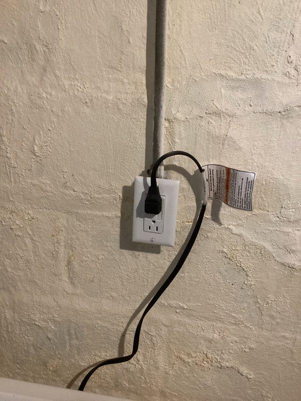 Installed GFCI outlet in laundry room to provide ground fault protection for washing machine circuit. Verified proper operation and tested reset functionality to ensure code compliance and safe operation.