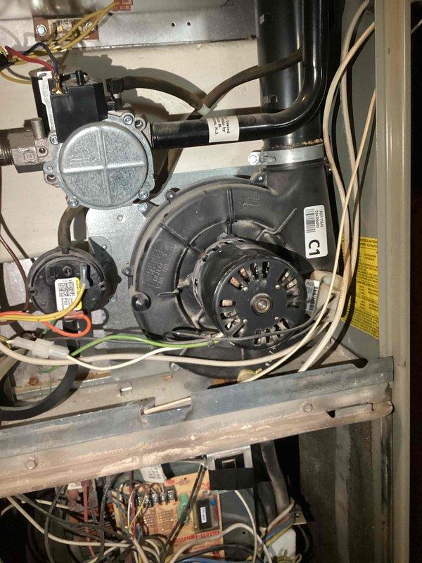 Responded to no-heat call and diagnosed furnace failure to cycle. Upon inspection, determined the inducer motor had failed and was preventing the heating system from operating. Successfully replaced the defective inducer motor with new unit, restoring full furnace operation and heat to the property.