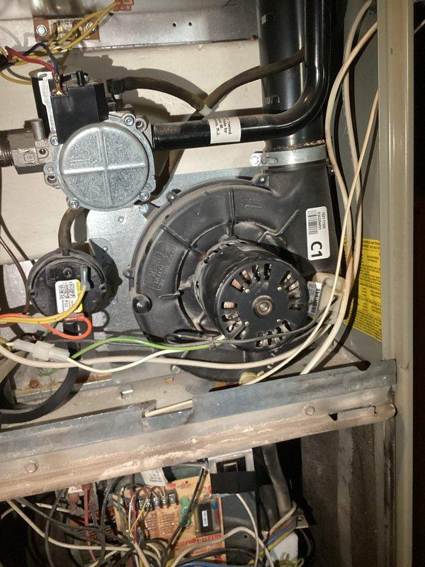 Responded to no-heat call and diagnosed furnace failure to cycle. Upon inspection, determined the inducer motor had failed and was preventing the heating system from operating. Successfully replaced the defective inducer motor with new unit, restoring full furnace operation and heat to the property.