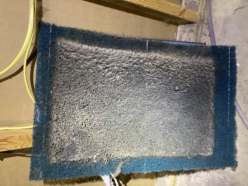 Responded to no heat call on residential furnace system. Upon inspection, identified heavily soiled air filter with significant dust accumulation restricting airflow and dirty blower wheel impeding proper operation. Removed and replaced clogged filter, then accessed air handler cabinet to clean blower wheel assembly. System restored to normal heating operation with improved airflow efficiency.