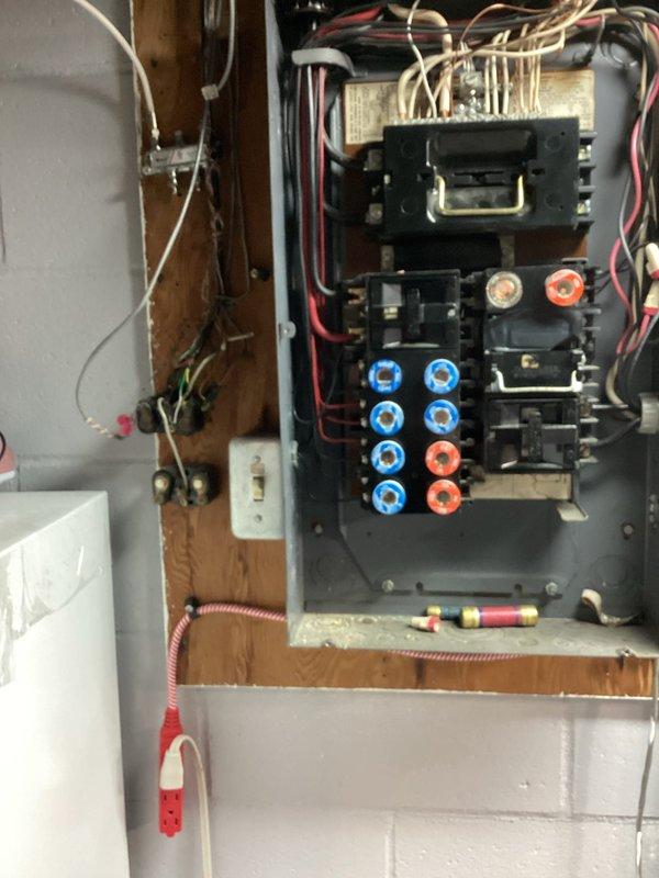 Responded to no-power call for residential furnace system. Upon arrival, confirmed complete loss of power to TempStar furnace unit. Performed electrical inspection of furnace control panel and associated electrical components mounted on wooden framing near HVAC installation. Identified electrical supply issue requiring specialist intervention and coordinated electrician dispatch to address power distribution problem affecting furnace operation.