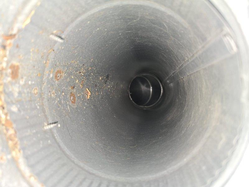 Completed comprehensive duct and dryer vent cleaning service addressing significant accumulation of dust and pet hair throughout the ventilation system. Thoroughly cleaned all accessible ductwork, removed debris buildup including visible rust-colored contamination and corrosion from interior duct surfaces, and cleaned all register vents to restore proper airflow and indoor air quality.