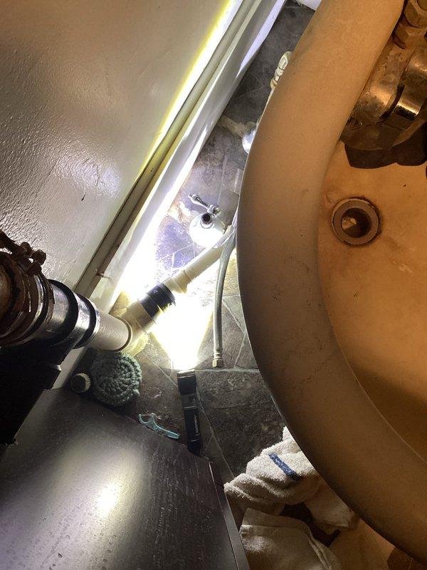 Responded to emergency plumbing call for failed angle stops serving a clawfoot tub. Upon arrival, found that the compression fittings on the existing angle stops had deteriorated and separated at the supply lines, causing an active water leak. Shut off water supply to prevent further damage. Removed the compromised angle stops and supply connections. Installed new 1/2" x 3/8" angle stops with proper compression fittings to restore water service to the clawfoot tub. Restored water supply, tested all connections under pressure, and verified proper operation with no leaks detected.
